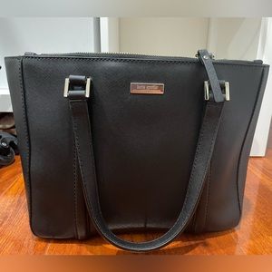 Kate Spade handbag in black Saffiano leather.